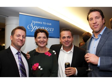 From left, Dave Renfrew with Rebecca Brown and Kyle Brown, and Christie Lake Kids board member Trevor Doyle, owner of Doyle Homes,  at An Unlikely Pairing: Adventures in Food Trucks and Fine Wines, held in support of Christie Lake Kids on Thursday, November 12, 2015, at Ashbury College in Rockcliffe Park. (Caroline Phillips / Ottawa Citizen)
