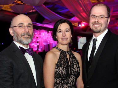 From left, Dr. David Moher, recipient of the Grimes Research Career Achievement Award, with Dr. Carolina Ilkow, recipient of the Worton Researcher in Training Award, and Dr. Marc Carrier, recipient of the Chretien Researcher of the Year Award, at The Westin Ottawa on Saturday, November 21, 2015, for The Ottawa Hospital Gala, which celebrates leading researchers and their accomplishments. (Caroline Phillips / Ottawa Citizen)