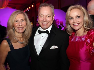 From left, gala committee member Micheline McElligott with Tim Kluke, CEO of The Ottawa Hospital Foundation, and gala co-chair Whitney Fox at this year's sold-out gala held at The Westin Ottawa on Saturday, November 21, 2015. (Caroline Phillips / Ottawa Citizen)