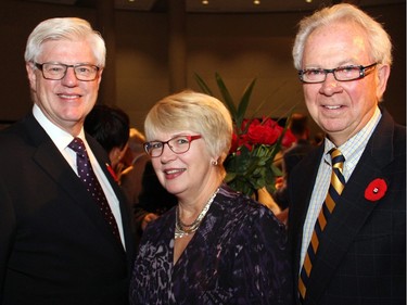 From left, John Manley with his wife, Judith, and Larry Dickenson at the second annual Embassy Chef Challenge held Thursday, November 5, 2015, at the John G. Diefenbaker Building on Sussex Drive, to raise funds toward new equipment for a specialized IBD procedure room at the Children's Hospital of Eastern Ontario.