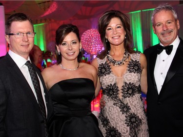 From left, lawyer Ryan Keon with his wife, Cindy Tomlinson-Keon, who co-chaired this year's Ashbury Ball with Kristine McGinn, seen with her husband, Walt McGinn, president at Allegra Print & Imaging, at Ashbury College in Rockcliffe Park on November 7, 2015.