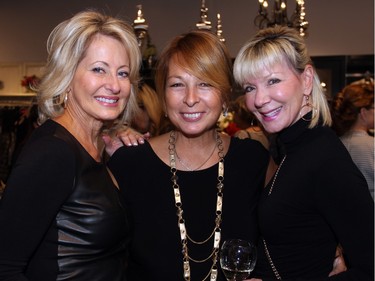 From left, Linda Brownrigg, Michelle Begin and Denise Bourque were part of a group of friends that attended the Fashion FUNraiser for Bruyère, held at the Shepherd's clothing store in the Train Yards shopping district on Monday, November 23, 2015.