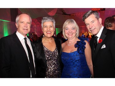 From left, Peter Froislie with his wife, Jayne Watson, CEO of the NAC Foundation, and Ashbury College board member Carol Devenny, PwC, with her husband, Grant McDonald, KPMG, at the annual Ashbury College ball held in Rockcliffe Park on Saturday, November 7, 2015.