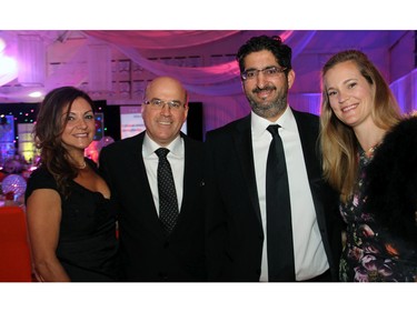 From left, Shirley Kouri and her partner Michael Mrak from Mark Motors with Neil Malhotra, vice-president of Claridge Homes, and his wife, Ainsley Malhotra, at the Ashbury Ball held Saturday, November 7, 2015, at Ashbury College in Rockcliffe Park.
