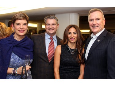 From left, Tracy Rait-Parkes and her husband, event chair Scott Parkes, from title sponsor, the Taggart Parkes Foundation, with Suzanne Farhat and Paul McCarney, with the McCarney Family Foundation, at An Unlikely Pairing: Adventures in Food Trucks and Fine Wines, held in support of Christie Lake Kids on Thursday, November 12, 2015, at Ashbury College in Rockcliffe Park. (Caroline Phillips / Ottawa Citizen)