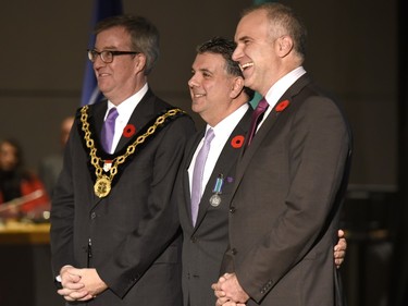 Gary Zed receives the Order of Ottawa from Mayor Jim Watson and Councillor Tobi Nussbaum at City Hall in Ottawa on Tuesday, November 10, 2015.