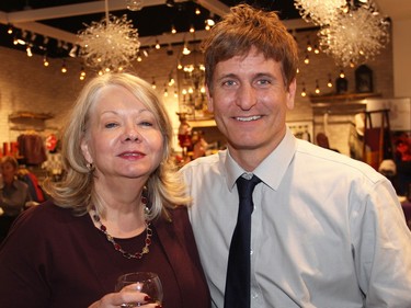 Gini Bethell, first vice-chair of the Bruyère board of directors, with the evening sponsor, John A. Piche, owner of Omega Laser Therapy, at Shephed's on Monday, November 23, 2015, during the Fashion FUNraiser for Bruyère and its rehabilitation, long-term and palliative care facilities.