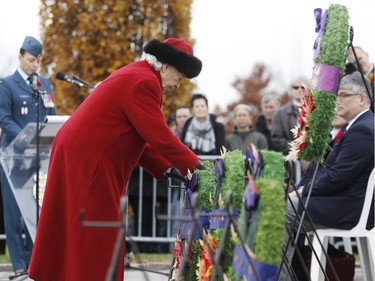 Grete Hale lays a wreath for the Beechwood Cemetery Foundation during the Remembrance Day ceremony at the National Military Cemetery on the grounds of the Beechwood Cemetery Wednesday November 11, 2015.