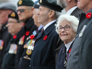 Veteran Elsa Lessard waits with her fellow veterans for the ceremony to begin.