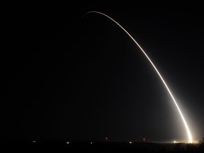In this photo provided by Vandenberg Air Force Base, an unarmed Minuteman III intercontinental ballistic missile equipped with a test reentry vehicle is launched from Vandenberg Air Force Base, Calif., on Wednesday, Oct. 21, 2015.