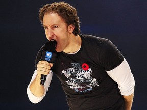 Craig Kielburger pumps up the crowd during the We Day event at the Canadian Tire Centre in Ottawa on Tuesday, Nov. 10, 2015.