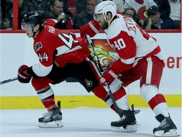 J.G. Pageau (left) races for the puck with Detroit's Henrik Zetterberg during first period action between the Ottawa Senators and Detroit  Red Wings Monday (Nov 16, 2015) at Canadian Tire Centre.
