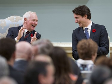 Governor General David Johnston shares a laugh with Prime Minister Justin Trudeau after he was sworn in as prime minister at Rideau Hall in Ottawa on Wednesday, Nov. 4, 2015.