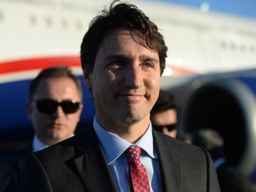 Prime Minister Justin Trudeau arrives in Antalya, Turkey, on Saturday, Nov. 14, 2015, to take part in the G20 Summit. Trudeau has said he remains confident 25,000 Syrian refugees can be resettled in a safe and responsible manner.