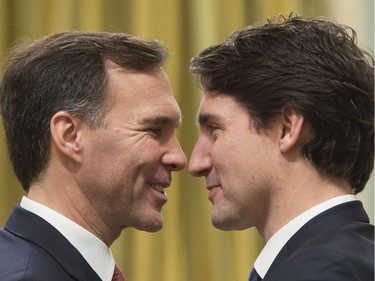 Prime Minister Justin Trudeau, right, goes face-to-face with Finance Minister Bill Morneau at Rideau Hall in Ottawa on Wednesday, November 4, 2015.