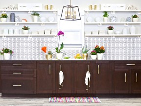 Designer Tiffany Pratt created this vignette for Home Depot to show how open shelves, "sexy" backsplash tiles and hits of gold can update a kitchen.