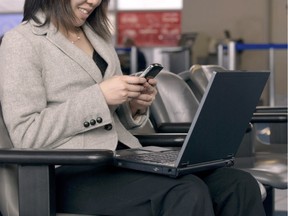 Local Input~ FOR NATIONAL POST USE ONLY - A businesswoman with a blackberry and a laptop. Credit: fotolia.
Keywords:  blackberry; business; airplane; air; aircraft; airport; adult; being; board; busy; colleague; colour; company; computer; contemporary; corporate; corporation; deal; digital; director; executive; fast; female; flight; fly; formal; global; happy; human; image; images; important; indoors; inside; international; jet; laptop; lear; life; live; living; love; woman; asian; men; telecommute; modern; on; only; pda; people; person; plane; rich; seats; sitting; smart; smiling; suit; technology; travel; traveler; traveling; urban; women; work; working; www; young; youth; terminal; gate; arrival; departure