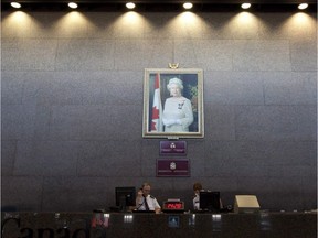 A portrait of the Queen once hung at the entrance to the Department of Foreign Affairs building. The paintings it replaced have now been rehung and the monarch is gone.