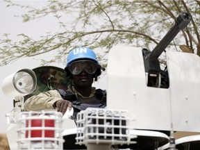 A file photo taken on July 27, 2013 shows United Nations (UN) soldiers patrolling in the northern Malian city of Kidal.