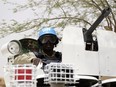 A file photo taken on July 27, 2013 shows United Nations (UN) soldiers patrolling in the northern Malian city of Kidal.