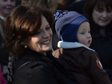 Margaret Trudeau and her grandson Hadrien stand oputside Rideau Hall waiting for the swearing-in of her son Prime Minister-designate Justin Trudeau in Ottawa on Wednesday, Nov. 4, 2015.