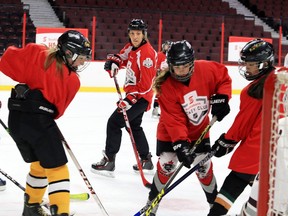 Files: Meghan Agosta, a three-time gold medla winner for the Canadian women's hockey team, keeps a watchful eye on kids at the Saturday at Scotiabank Girls HockeyFest.