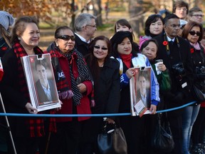 Members of the public wait on the grounds of Rideau Hall before the swearing-in ceremony of Prime Minister-designate Justin Trudeau.