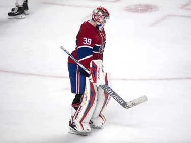 Montreal Canadiens' goalie Mike Condon skates off the ice after allowing an overtime goal to Ottawa Senators' Kyle Turris following NHL hockey action, in Montreal, on Tuesday, Nov. 3, 2015. The Senators beat the Canadiens 2-1.