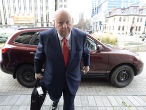 Sen. Mike Duffy on his way to the courthouse.