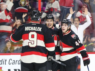 Milan Michalek, left, Cody Ceci and Jean-Gabriel Pageau, right, of the Ottawa Senators celebrate Ceci's first period goal.