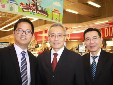 Officials from the Taipei Economic and Cultural Office (TECO) took in a Taiwanese cooking at T&T Supermarket Nov. 20. From left, store manager Jimmy Wen, Frank Ming-Cheng Lin, acting representative of TECO and Jeffrey C.T. Chu, director of the Taiwan Trade Centre in Toronto.