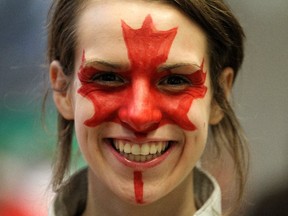 A fan anticipates the start of the Opening Ceremony of the 2010 Vancouver Winter Olympics at BC Place on February 12, 2010 in Vancouver, Canada.