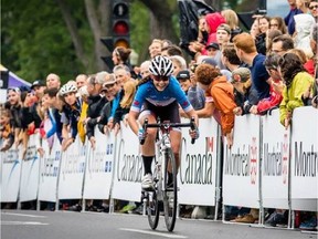 Ottawa cyclist Katherine Maine charges to the finish line and a surprising victory in the women's race at the National Criterium in Montreal.