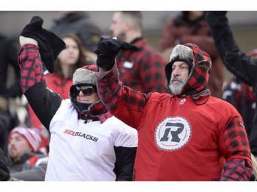 Ottawa Redblacks fans cheer ahead of first half action in the CFL East Division final in Ottawa on Sunday, November 22, 2015.