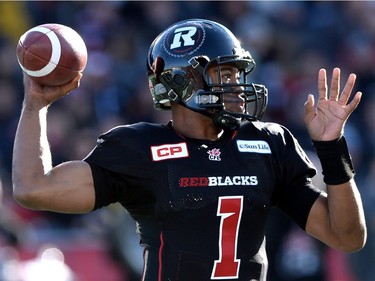 Ottawa Redblacks quarterback Henry Burris throws against the Hamilton Tiger-Cats during first half action in the CFL East Division final in Ottawa, Sunday November 22, 2015.