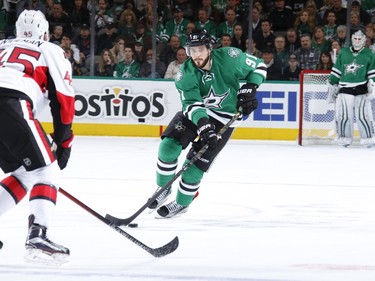 Tyler Seguin #91 of the Dallas Stars handles the puck.