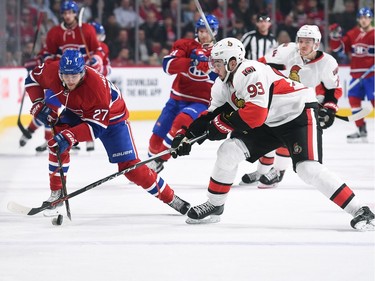 Alex Galchenyuk #27 of the Montreal Canadiens controls the puck against Mika Zibanejad #93  of the Ottawa Senators.
