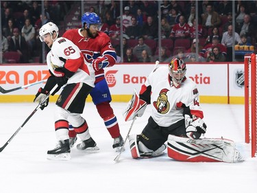 Craig Anderson #41 of the Ottawa Senators stops a shot by the Montreal Canadiens.