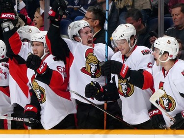 Mike Hoffman #68, Mark Stone #61, Bobby Ryan #6, and Shane Prince #10 of the Ottawa Senators celebrate from the bench after a goal .