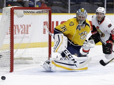 Nashville Predators goalie Pekka Rinne (35), of Finland, blocks a shot by Ottawa Senators left wing Mike Hoffman (68) during the first period.