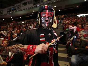 Peter Azzi gets the crowd pumped as a few thousand Ottawa Redblacks cheer at the TD Place arena as they watch the 2015 CFL Grey Cup Sunday May 29, 2015.
