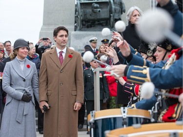 Prime Minister Justin Trudeau and his wife  Sophie Grégoire-Trudeau look on during the march past as the National Remembrance Day Ceremony takes place at the National War Memorial in Ottawa.