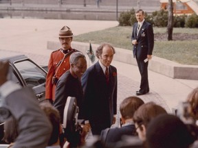 Prime Minister of Canada Pierre Elliott Trudeau greeting President Nyerere of Tanzania arriving for the Commonwealth Conference, Ottawa, 1973. Credit: Canada. Dept. of External Affairs / Library and Archives Canada / PA-196186