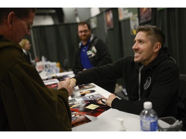 Ray Park, actor and martial artist who played Darth Maul in Star Wars shake hands with fans at Pop Expo.