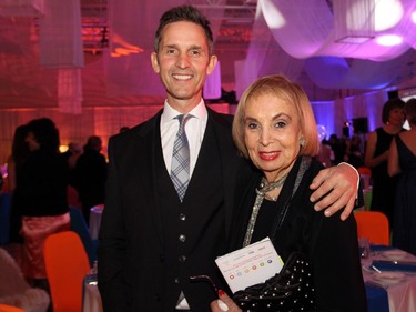 Real estate agents Charlie Sezlik and his mom, Cindy Sezlik, of Sezlik.com, attended the annual Ashbury Ball held at the Ashbury College in Rockcliffe Park on Saturday, November 7, 2015.