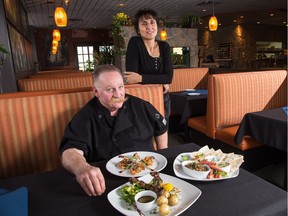 Caveau Méditerranéen's chef Alan McEwen and co-founder Jazia Azzi  show off some of the restaurant's dishes, including a range of mezze (small plates), lamb kabobs, and a shrimp appetizer with baba ghanouj / tomato sauce.