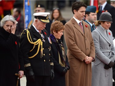Royal Canadian Legion's Silver Cross mother Sheila Anderson, left to right, Governor General David Johnston, Sharon Johnston, Prime Minister Justin Trudeau and Sophie  Grégoire-Trudeau take part in the Remembrance Day ceremony in Ottawa on Wednesday, Nov. 11, 2015.