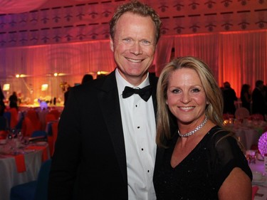 Royal LePage real estate agent and former Olympic rower Rob Marland, seen with his wife, Jane Forsyth, donated a free rowing lesson to the auction at the annual Ashbury Ball held at the Rockcliffe Park private school on Saturday, November 7, 2015.