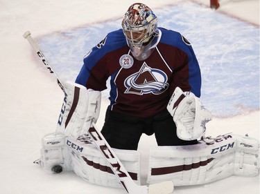 Colorado Avalanche goalie Semyon Varlamov, of Russia, makes a pad save on a shot by the Ottawa Senators during the first period of an NHL hockey game Wednesday, Nov. 25, 2015, in Denver.
