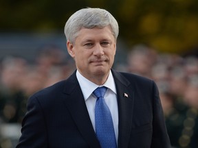 Stephen Harper arrives at a ceremony marking the one-year anniversary of the attack on Parliament Hill ,Thursday Oct. 22, 2015, at the National War Memorial in Ottawa.